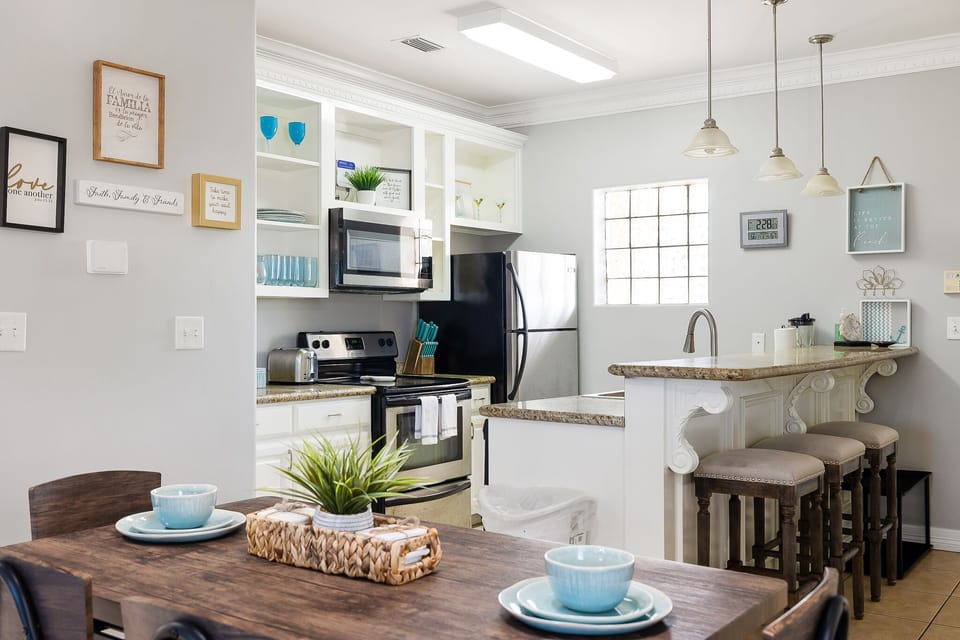 The breakfast bar offers extra seating for quick bites and conversation.