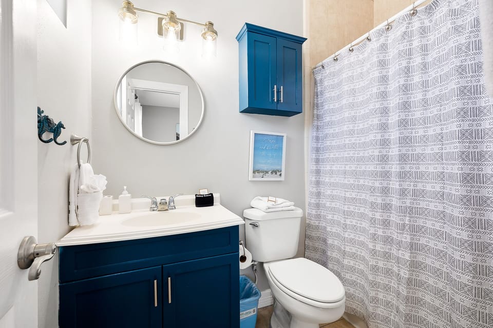 The shared full bathroom offers everything you need during your stay.