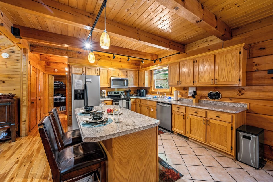 The kitchen is stylishly outfitted with stainless-steel appliances (both large and small) and is fully equipped with pots, pans, a slow cooker, wine glasses, sippy cups, tableware and utensils so you can prepare anything