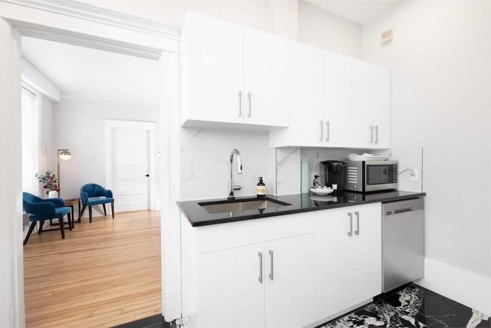 Kitchen is next to the beautiful dining room