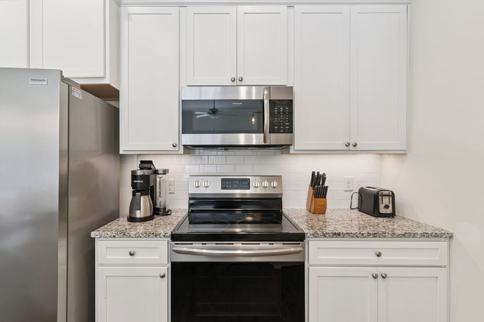 Your kitchen features stainless-steel appliances and granite countertops, ready for you to whip up your favorite meals during your stay.