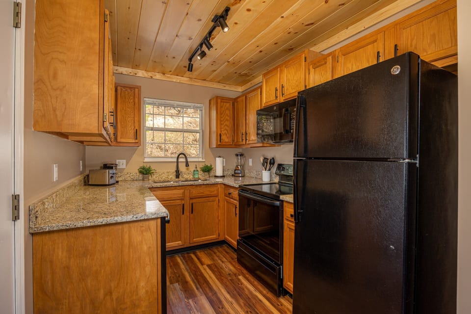 This kitchen has all you need to prepare meals, not just a bare minimum.