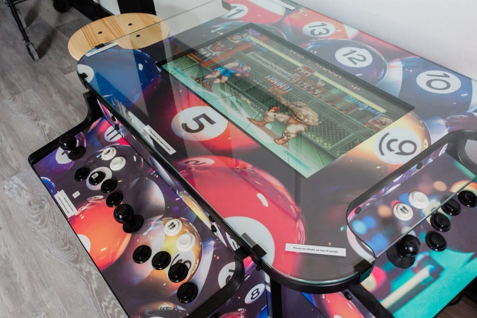 Custom-built arcade machine programmed with over 1100 classic video games.