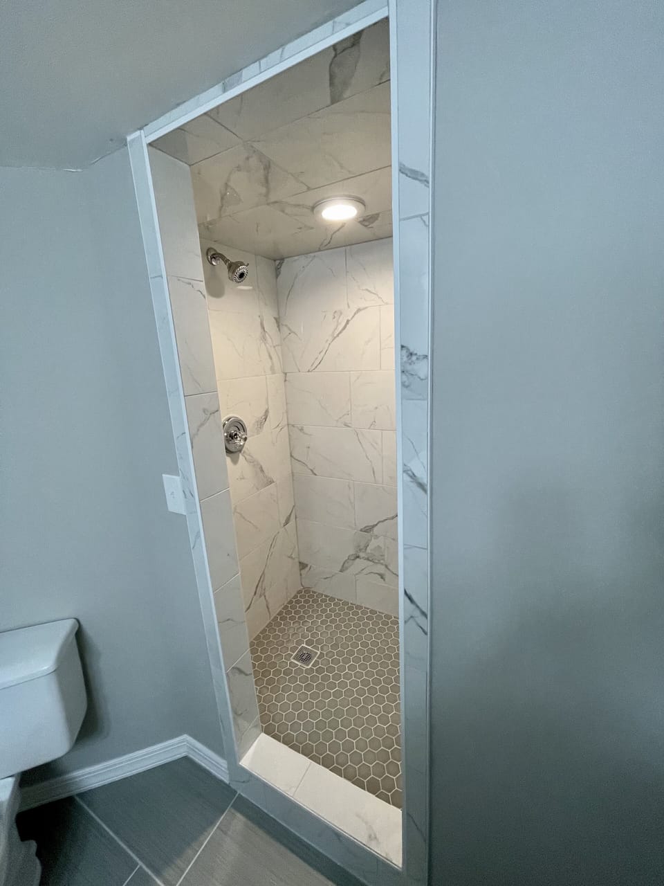 Gorgeous tiled shower in the Guest Bathroom