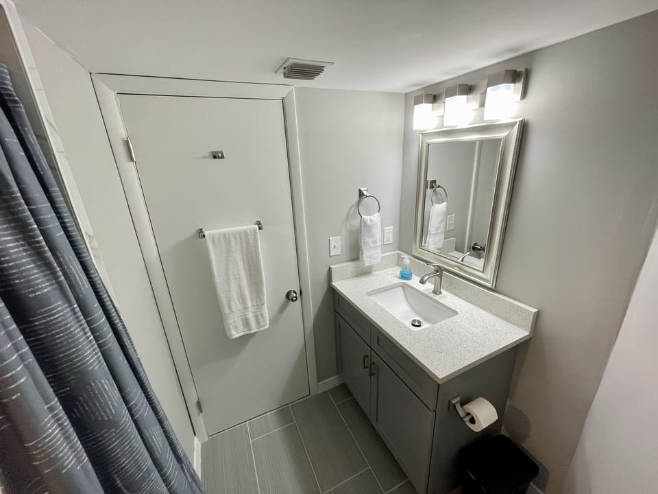 Luxurious Quartz countertops in both bathrooms