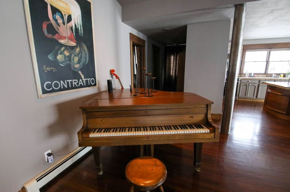 Gorgeous piano area, play a little tune! The acoustics in the home are amazing!