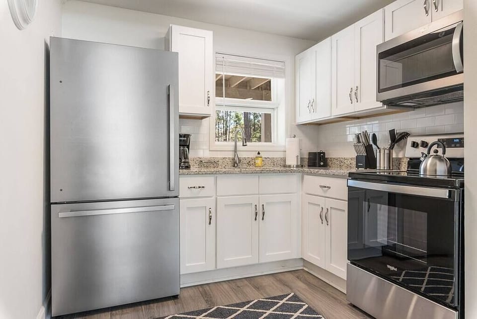 Fully stocked kitchen including drip coffee pot for your morning coffee