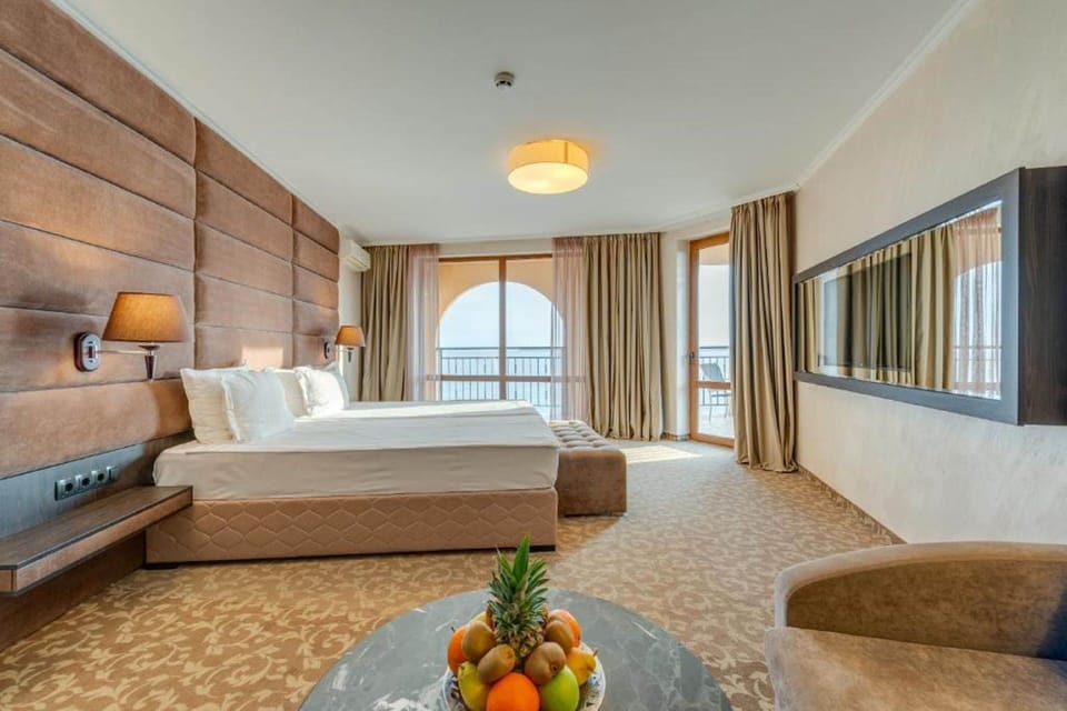 Luxury Double Room, Partial Sea View | Minibar, WiFi (free), bed sheets