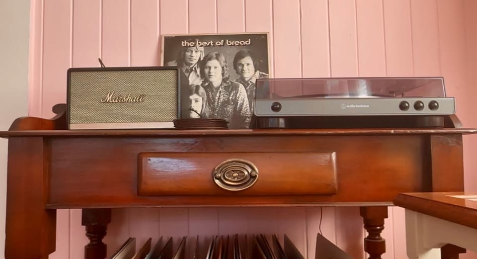 Enjoy the LP's provided or bring your own to enjoy on our retro turntable!