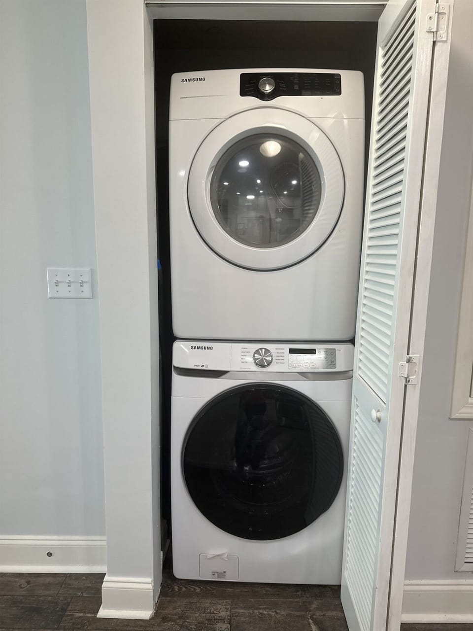 Your in-unit Samsung washer and dryer make packing light effortless, tucked neatly behind sleek louvered doors.