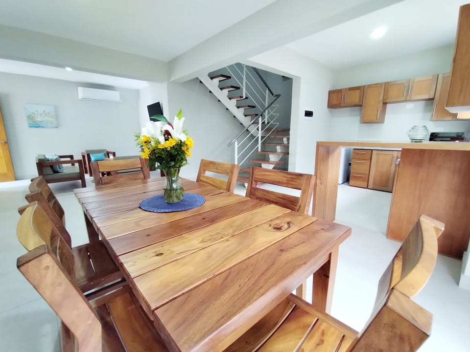 Dining and living areas of the 1st level of 3 bedrooms unit at A4.