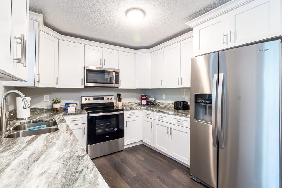 Fully equipped kitchen providing complimentary Keurig coffee