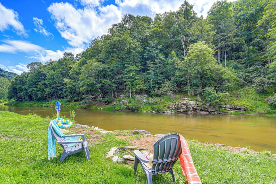 Exterior | Riverfront Fire Pit | Spacious Yard