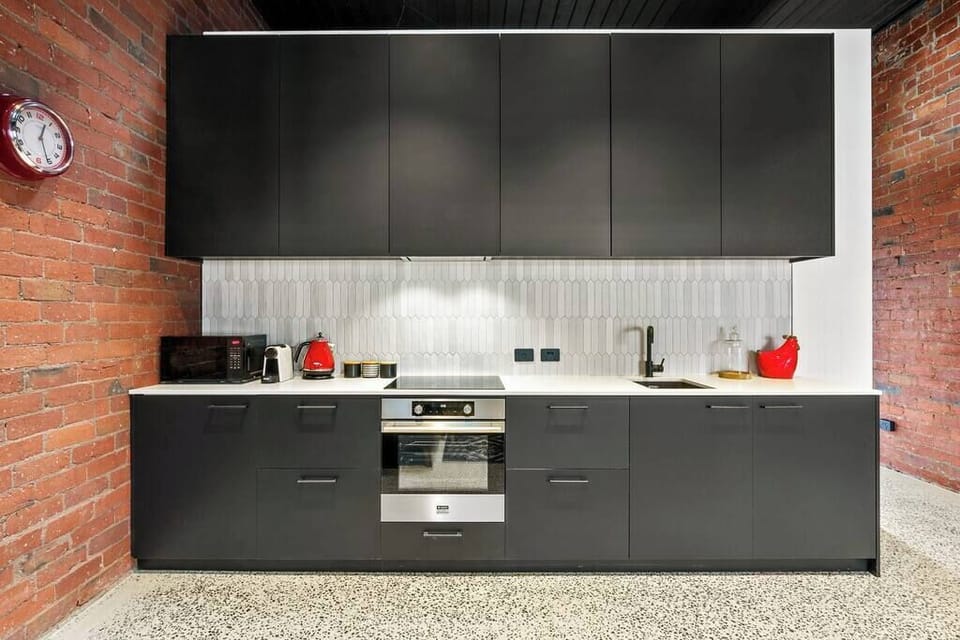 Full Kitchen with mini fridge, dishwasher, oven & stovetop
