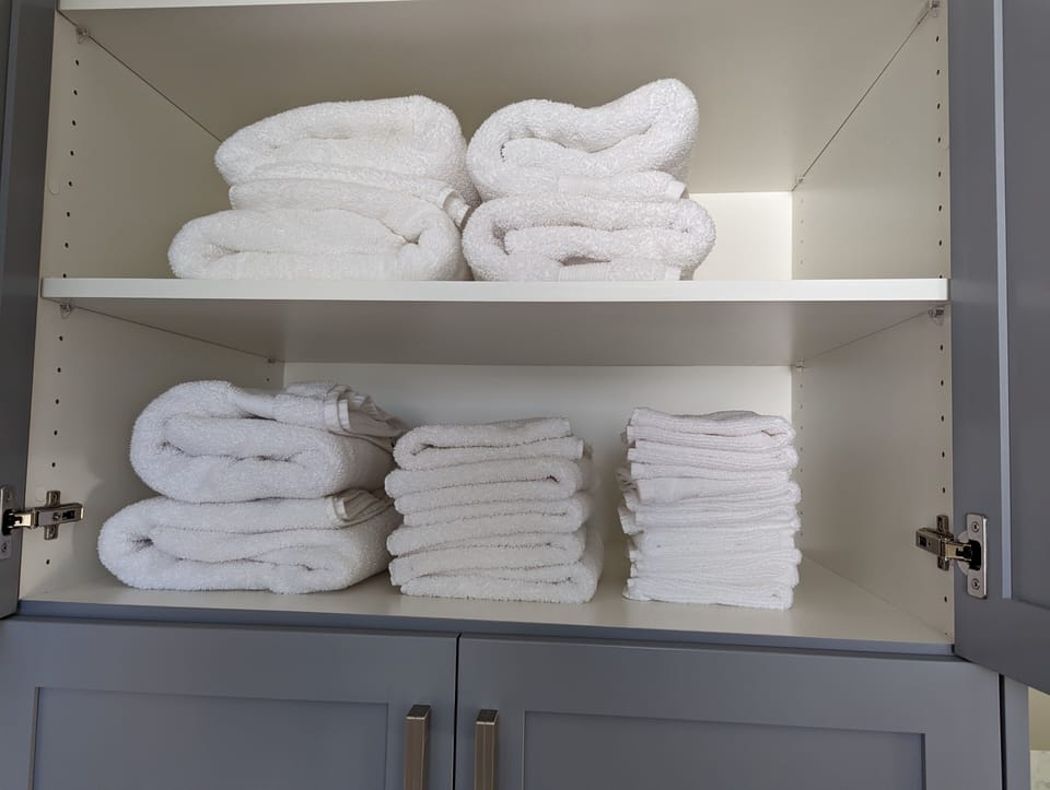 House outfitted with linens and towels.