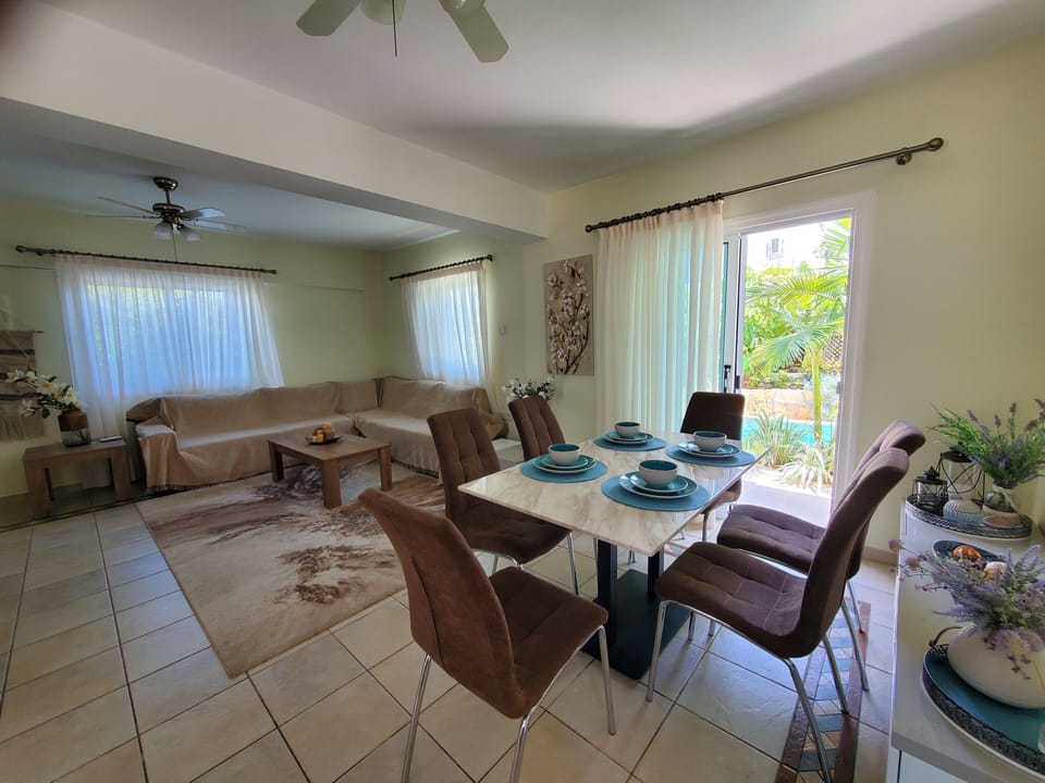 Villa | Living room | 30-inch TV with digital channels, fireplace