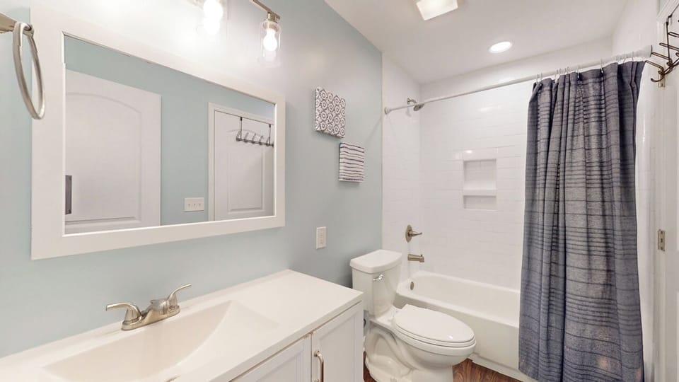 Jack and Jill Bathroom with Tub and Shower Combination