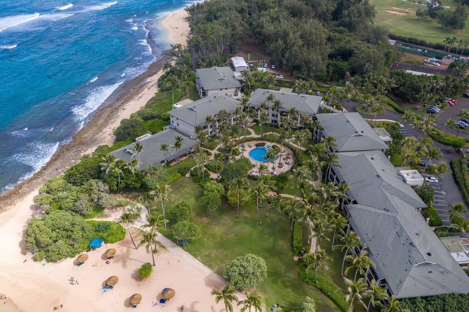 Aerial view of Ocean Villas: Lush Grounds, Turquoise water, pristine beaches!