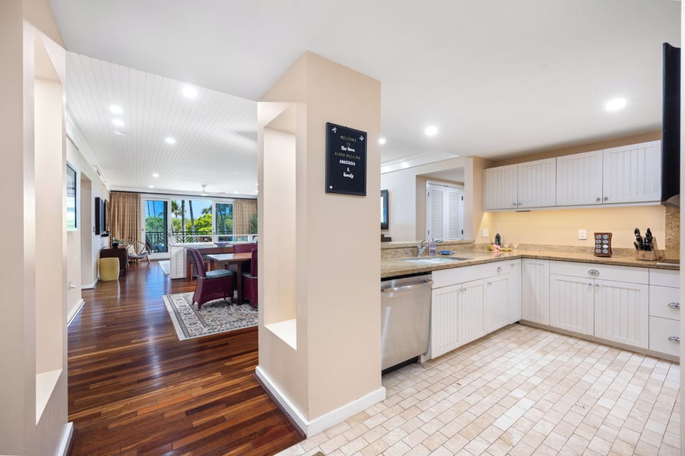 Spacious kitchen with granite counters opens into dining and living!