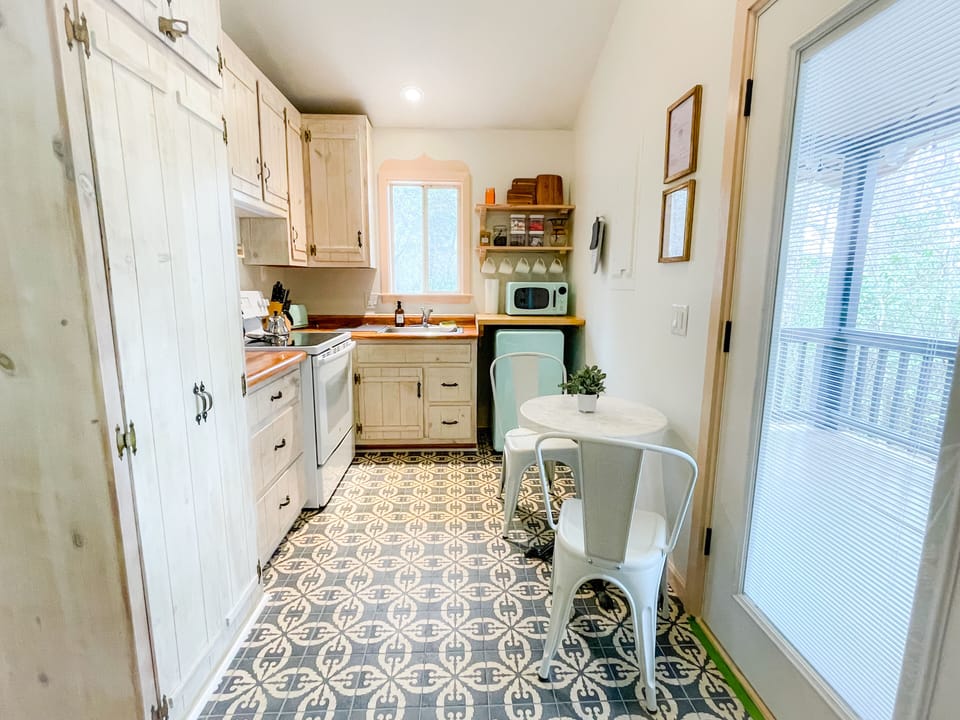 Fully stocked kitchen and dining table for 2