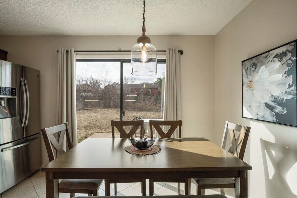 Dining area in kitchen, leads out to large fully fenced backyard.