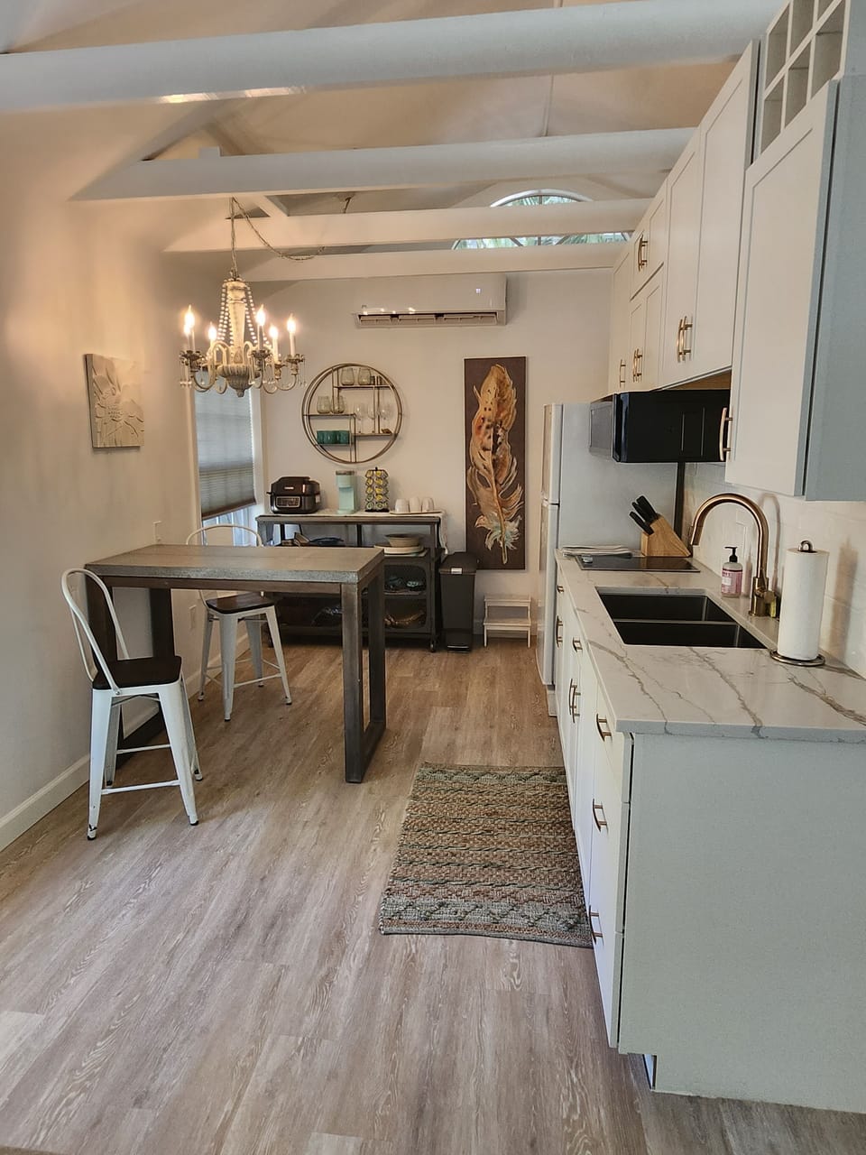 View of the kitchen with a split level AC and its many amenities