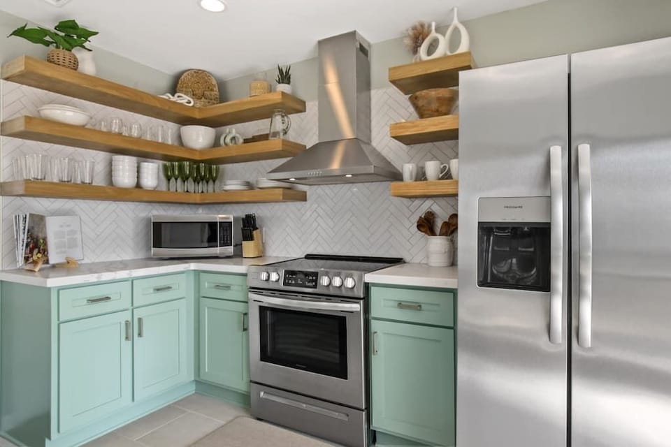The kitchen has new stainless steel appliances and all the cooking basics & utensils! Imagine making a wonderful dinner here for family and friends!