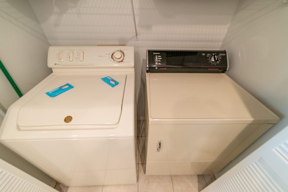 Full size washer & dryer for located in the kitchen for your convenience