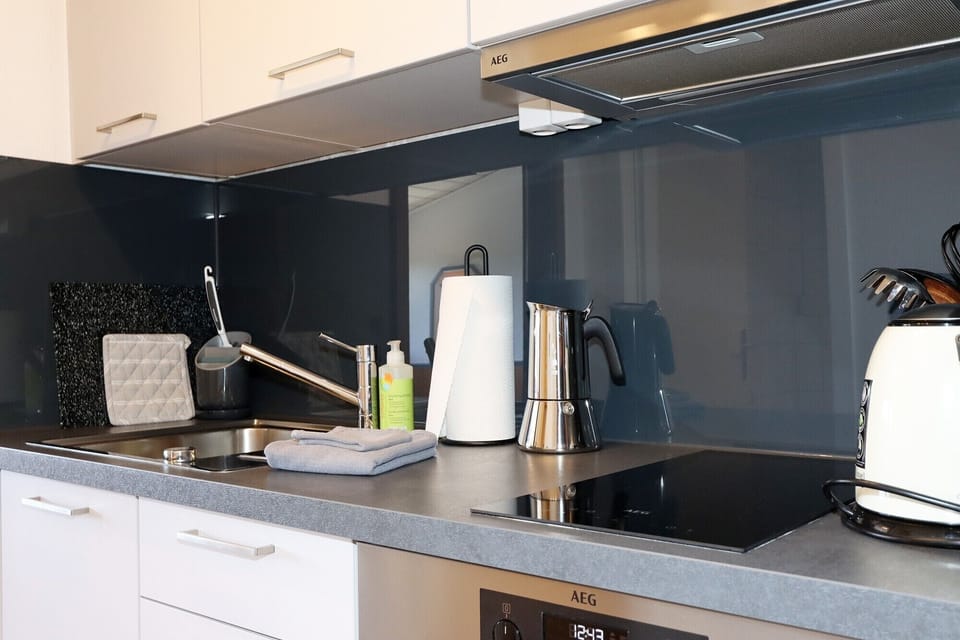 Comfort Apartment, Private Bathroom (Zwei Zimmer Hasenhorn) | Private kitchen | Highchair
