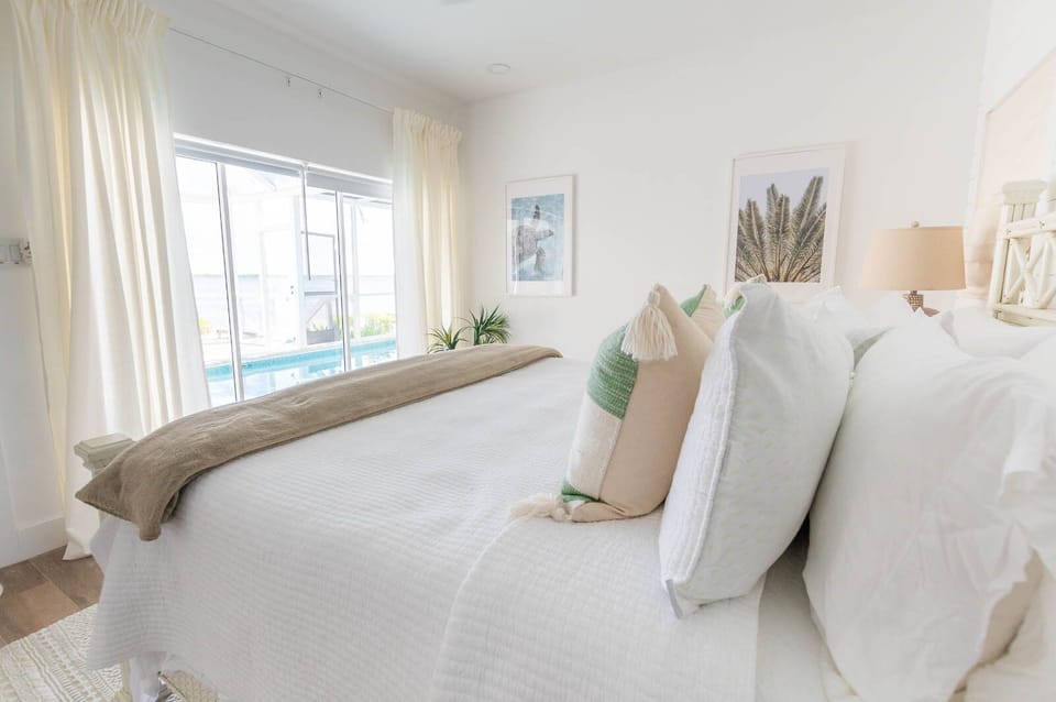 Large window overlooking pool and sea! What a view! MUST see in person. 