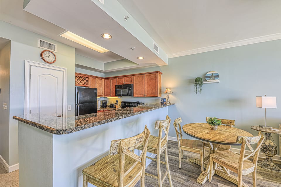 Kitchen and dining area with pantry.