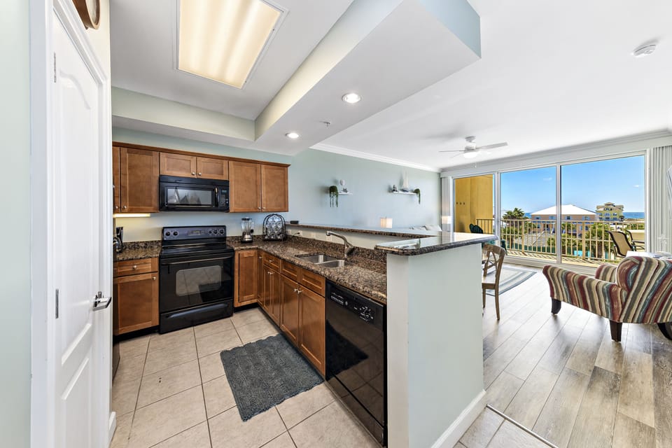 Kitchen with pantry, stocked with all the essentials you need.