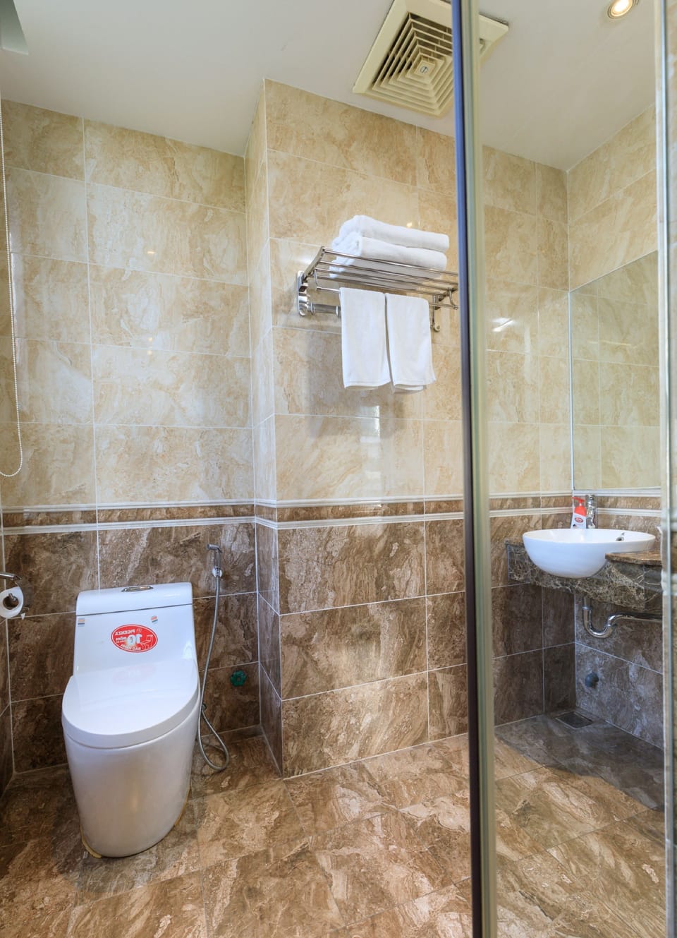 Shower, free toiletries, hair dryer, slippers