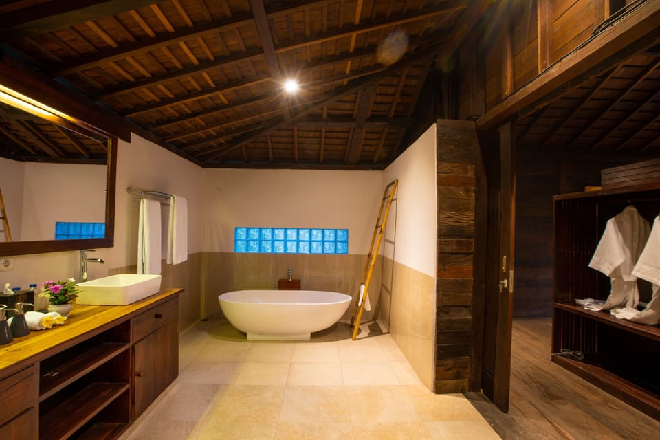 Family Room, 2 Bedrooms | Bathroom | Shower, rainfall showerhead, hair dryer, bathrobes