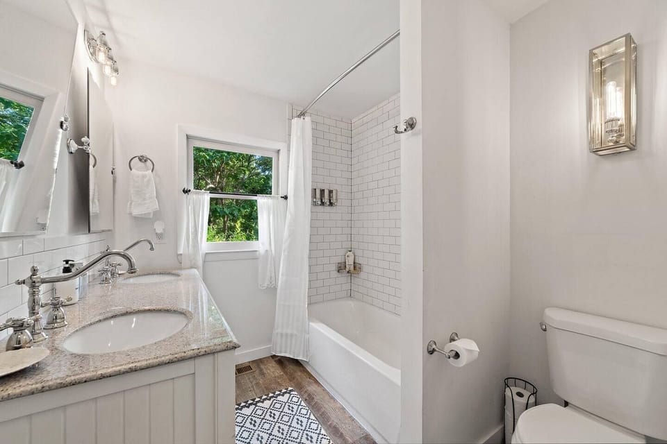 Bathroom #2: full bath on main floor with shower/bathtub combo