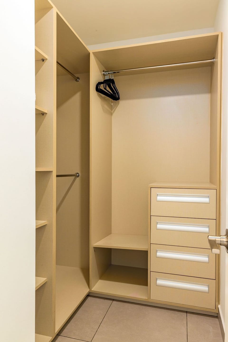 Step into your bright, modern bathroom with a spacious walk-in shower, crisp white finishes, and fresh towels waiting for you after a long day of exploring.