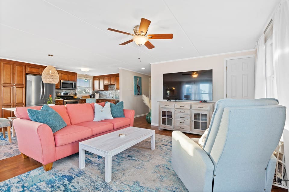 Enjoy the 65" TV in the living room while you take breaks from the beach.