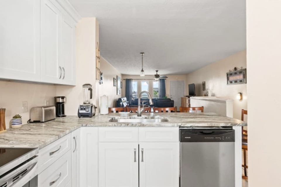 The Kitchen is conveniently located just off the dining room and living room, it keeps everyone connected while cooking or entertaining.