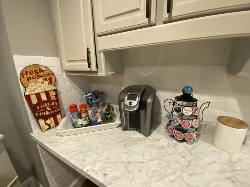 Coffee bar with Keurig machine and coffee pods