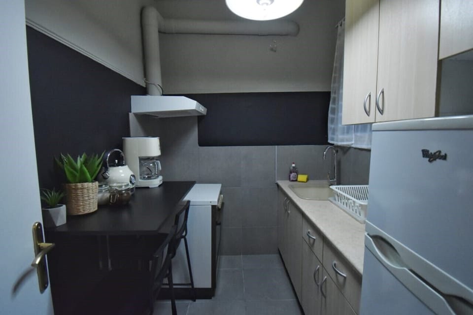Apartment | Private kitchen | Fridge, coffee/tea maker, electric kettle, dining tables
