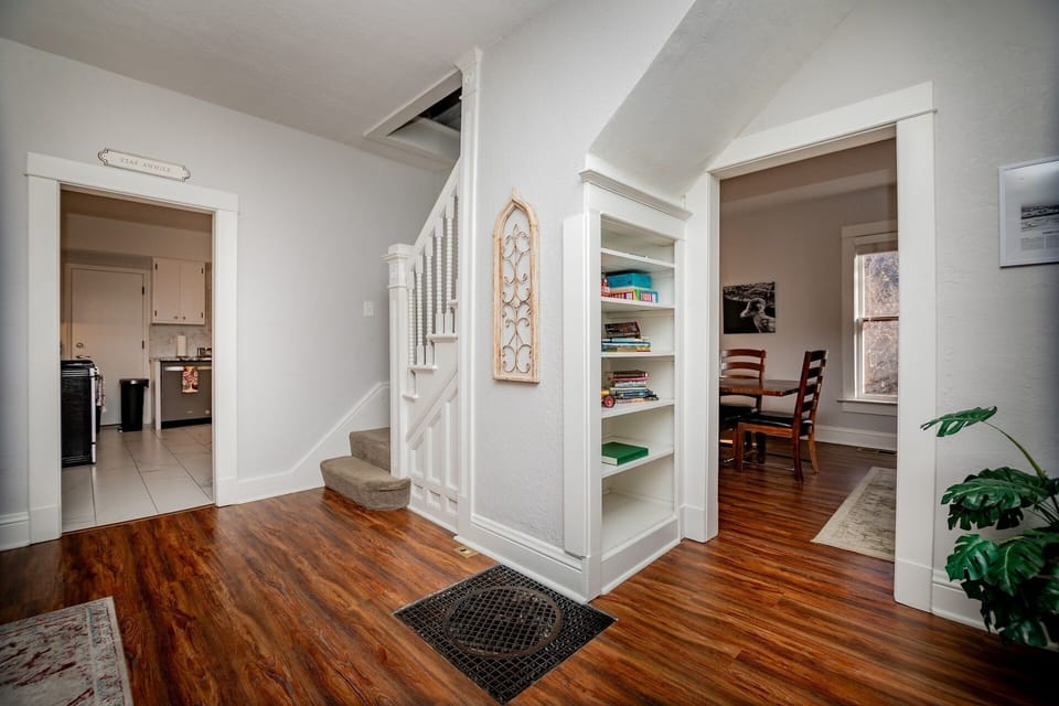 view to kitchen and dining as you walk in