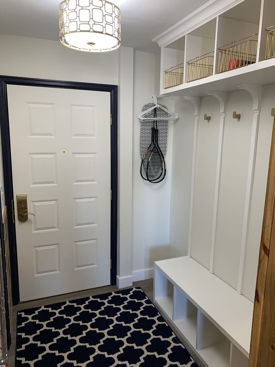 Mud room style entry way with lots of storage for luggage and clothes