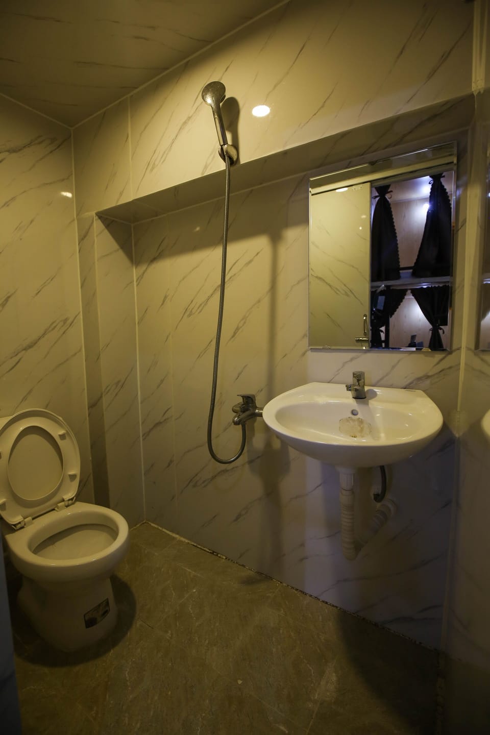 Economy Shared Dormitory | Bathroom | Hair dryer, towels