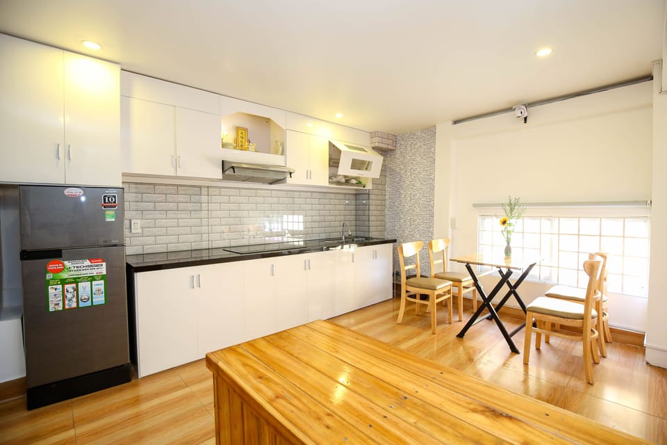 Fridge, cookware/dishes/utensils, cleaning supplies, paper towels