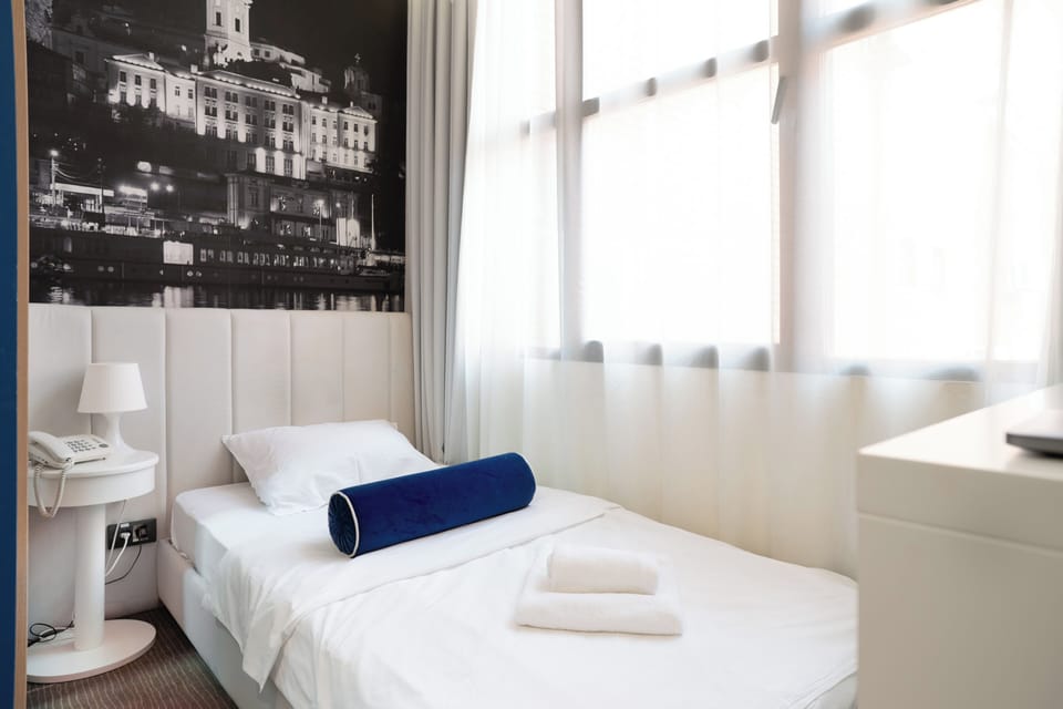 Comfort Room | Premium bedding, memory foam beds, desk, laptop workspace