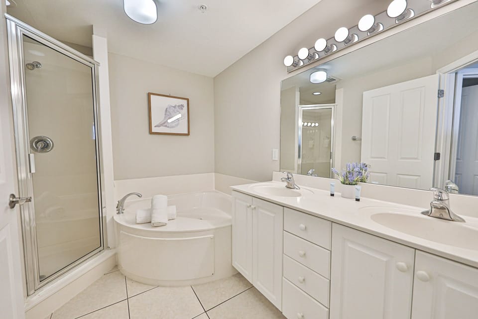 Master bedroom with separate shower and tub.