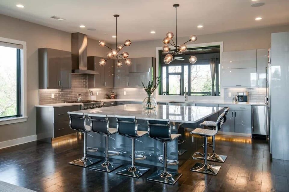 Our beautiful kitchen opens to not only the living room, but also the back patio through the rolling window!