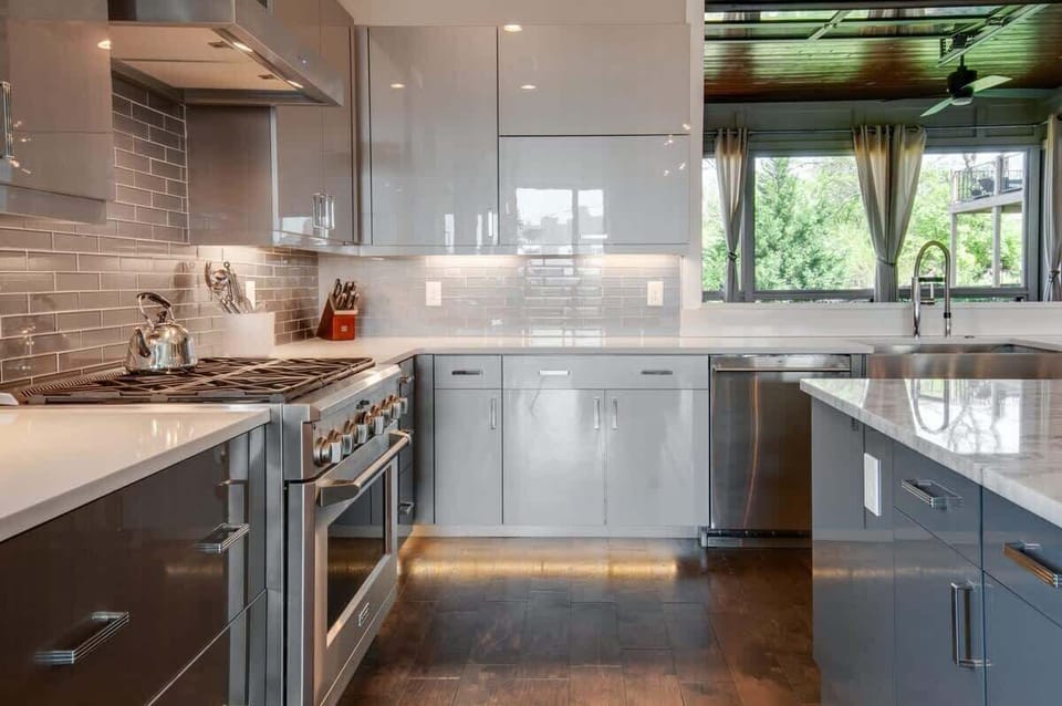 This kitchen features a gas range stove and beautiful appliances, perfect for all your culinary needs!