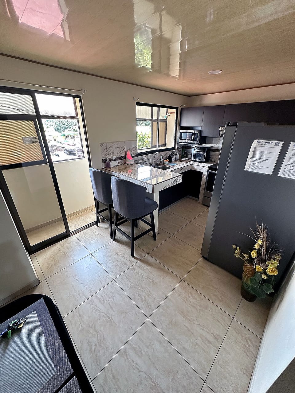 Deluxe Apartment, 2 Bedrooms, Air conditioning (Entire Two-Bedroom Apartment for 4) | Private kitchen | Full-size fridge, microwave, oven, stovetop