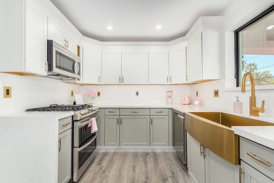 What girl doesn't love a pink Keurig and pink toaster, not to mention the glamorous gold accents throughout the kitchen?! Our kitchen is stocked with everything you need to prepare a simple meal when you're enjoying the home too much to leave it!